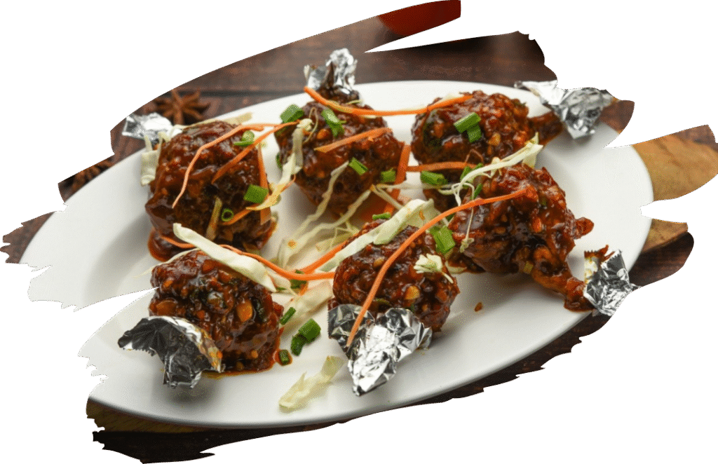 meat of chicken wings or drumsticks. The meat is pushed down one end of the bone to form a shape resembling a lollipop, then coated in a spiced batter, and Tossed in sweet spicy and tangy sauces