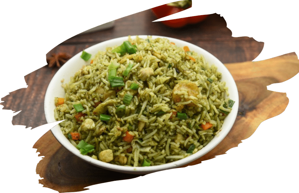 Indo-Chinese fried rice variation. It gets its signature green color and distinct earthy flavor from a blended paste of palak (spinach) and brahmi (Indian pennywort) leaves with egg, prawn and chicken